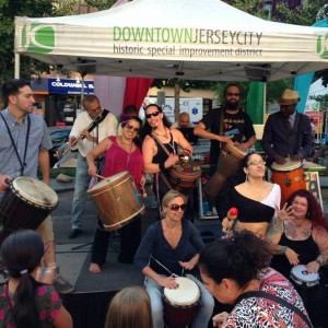 Sirelo Leads Drum Parade at All About Downtown Fair 2014